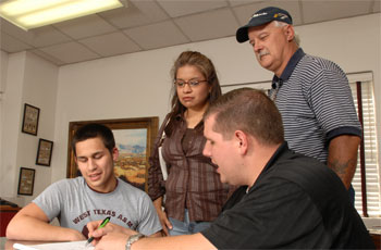 Parents and student with faculty